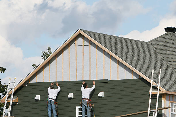 Professional Siding technician working in La Belle, PA
